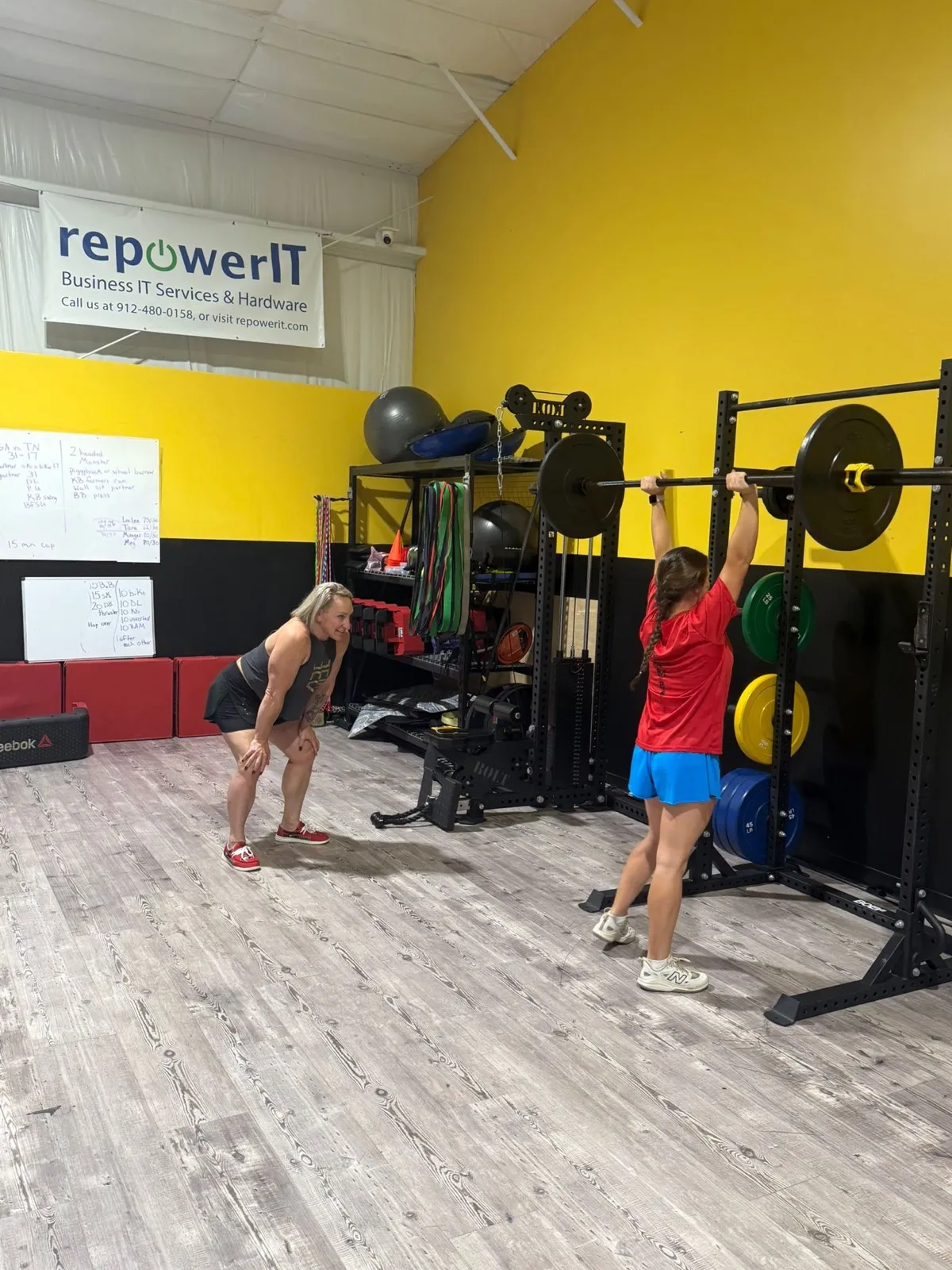 A young athlete training in the Empire Gym rack area
